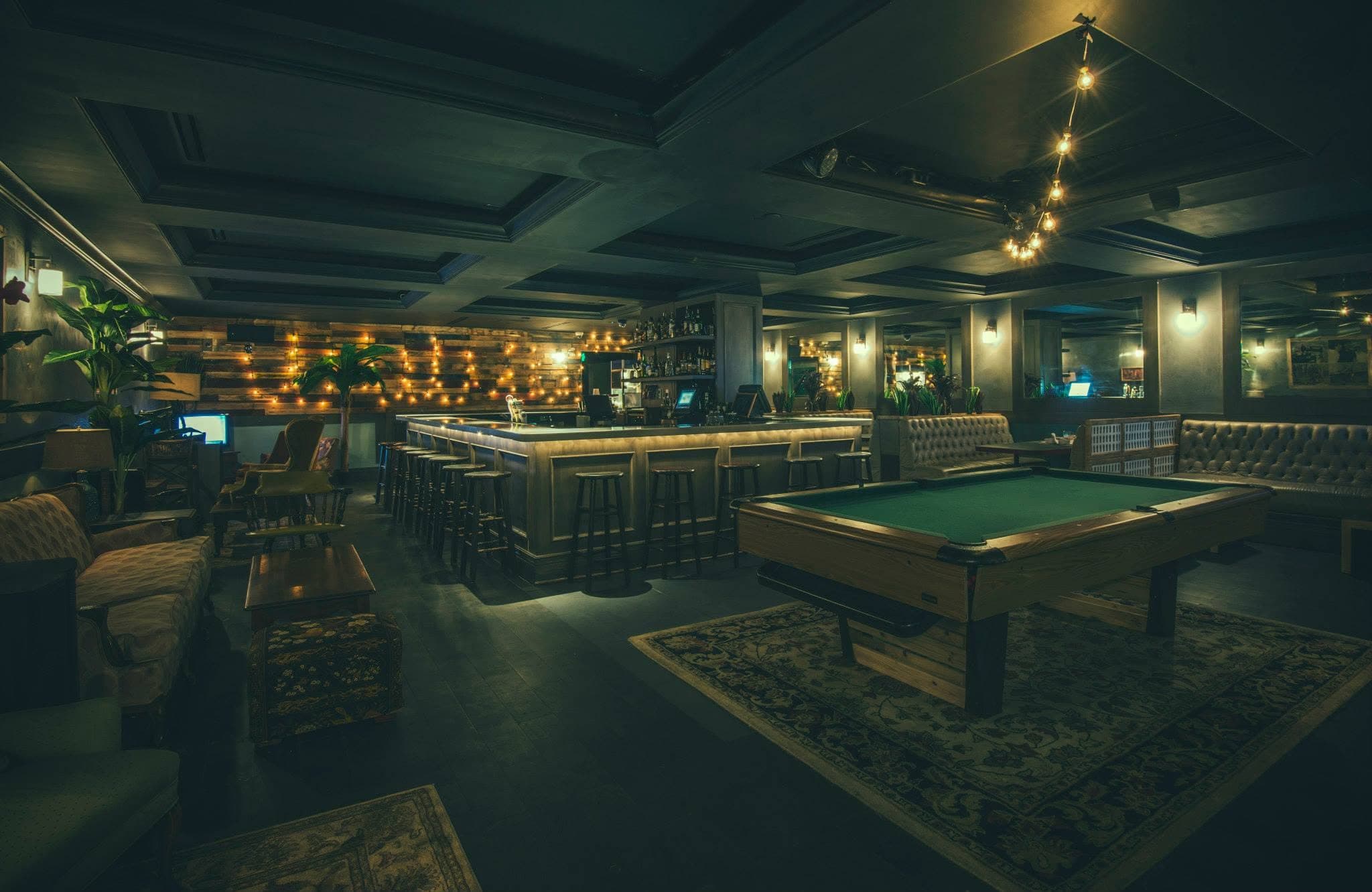 Warm-lit interior of Better Days dive bar in Brickell